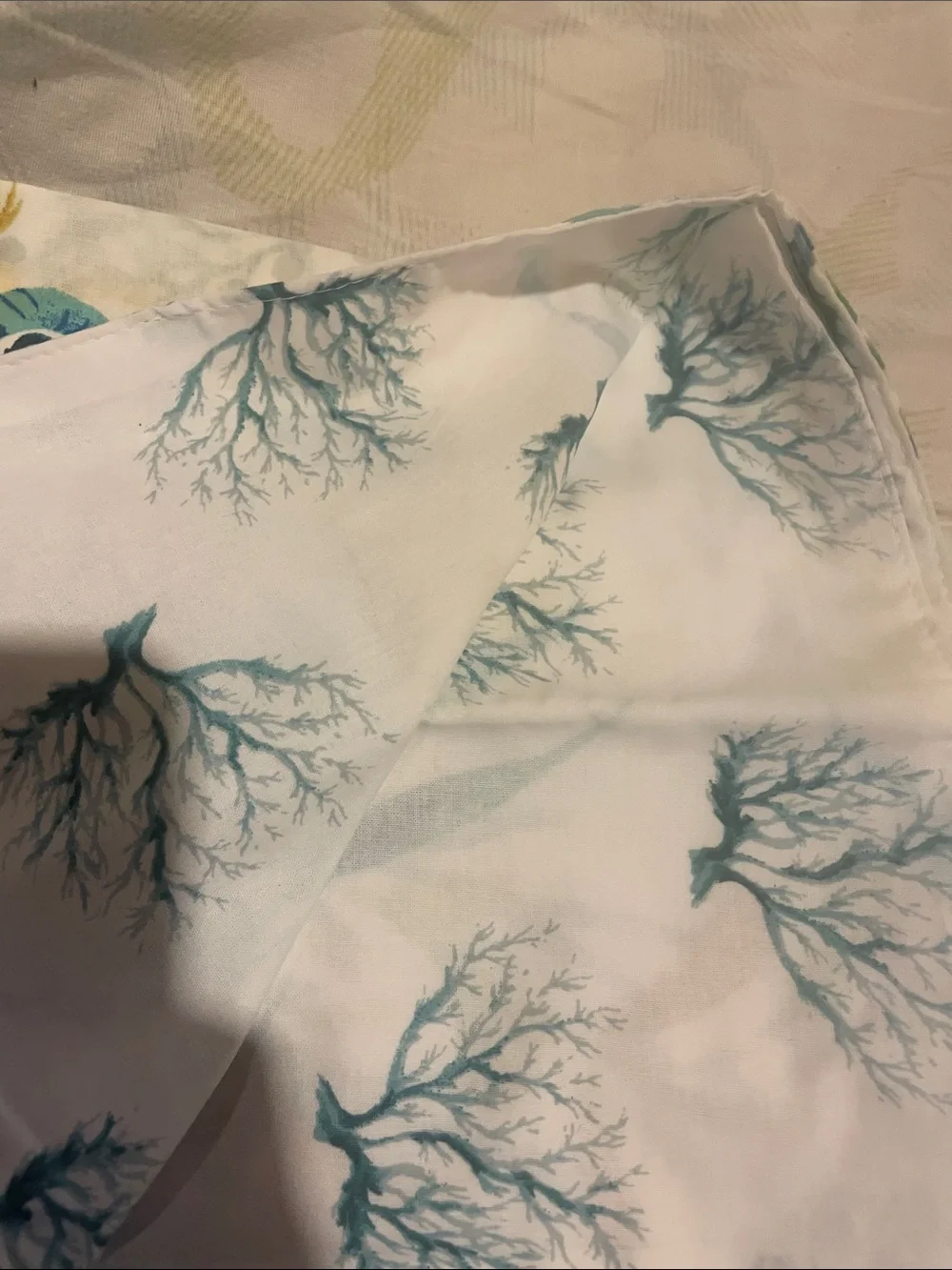 Handcrafted Cotton Napkin with Teal Seaweed Motif and shells . Set of 4